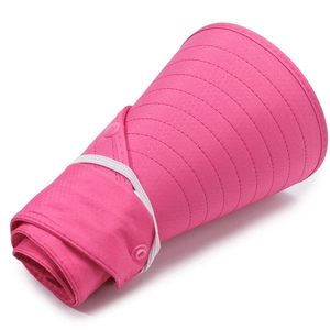Detail of rollable pink sun hat showing honeycomb fabric texture and elastic strap with snap