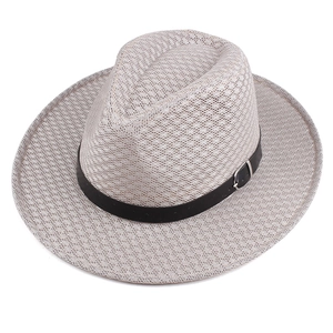 Close-up of breathable mesh hollow Fedora hat with black ribbon and silver metal buckle