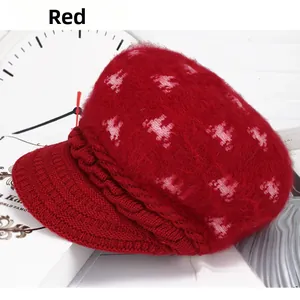 Detail of red winter knit hat with animal pattern and soft plush texture finish