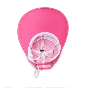 Detail view of pink sun hat featuring mesh lining, sweatband, and adjustable chin strap