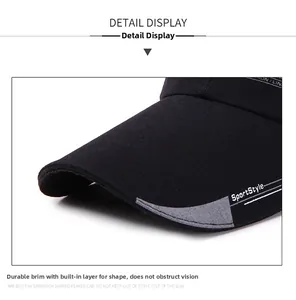 Detail of sturdy long brim on black baseball cap with SportStyle embroidery and knit texture