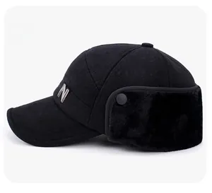 Detail view of winter wool cap with fold-down earflaps and warm faux fur lining