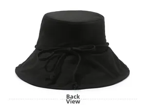 Detail view of the rear adjustable bow on a black cotton bucket hat for women