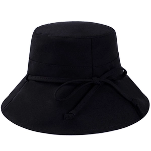 Women's black cotton sun bucket hat with decorative bow tie on a clean white background