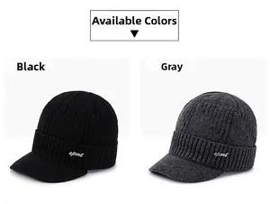 Detail view of winter knitted beanies in black and grey with sport embroidery