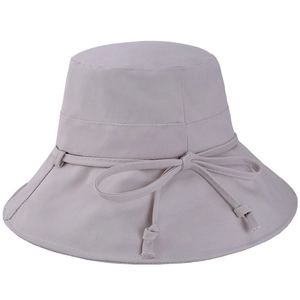 Women's foldable cotton canvas bucket hat in grey-pink with a decorative bow