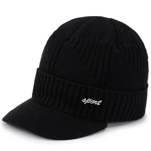 Thick black knitted winter hat for men with brim and sport metal emblem decoration