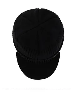 Top down view of black winter knit peaked beanie hat showing crown stitching details