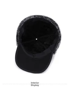 Interior detail of winter thermal baseball cap showing thick faux fur lining for warmth