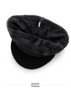 Detail of warm grey faux shearling lining inside a black knit winter beanie cap