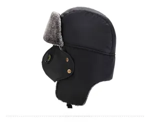 Detail of winter trapper hat with grey faux fur lining and breathable mask valve