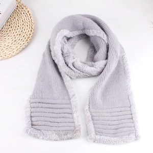 Winter light gray thick knit scarf with warm plush lining and ribbed edges shown on flat lay