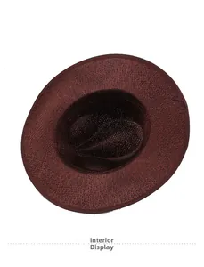 Interior view of deep red wide brim straw hat showing textured weave and inner lining detail