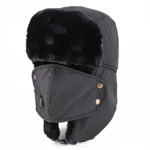 Detail of winter trapper hat featuring detachable face mask with breathing valve
