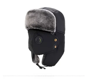 Detail view of winter trapper hat with artificial fur lining and detachable face mask