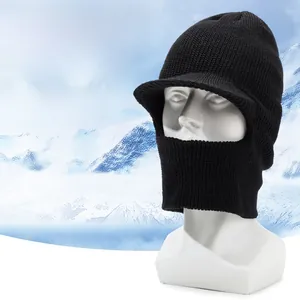 Detail of thick knit balaclava with brim for men, showing winter face and neck coverage
