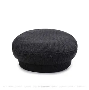Vue détaillée arrière d'une casquette militaire noire montrant la texture en tweed
