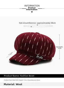 Detail view of burgundy newsboy hat with white stripes and rhinestone logo and size specs