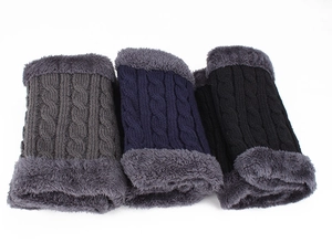 Close-up of knit neck warmer with thick fleece lining in grey, navy and black colors