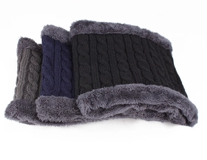Detailed close-up of cable knit neck warmer with thick faux fur lining in black and grey