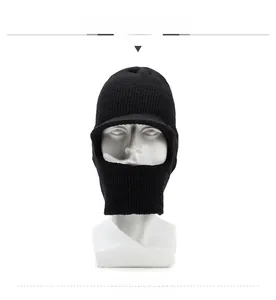 Detail of black winter knit balaclava with visor and neck warmer for men's cold protection