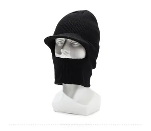 Detail view of black knitted winter balaclava with brim on a mannequin head