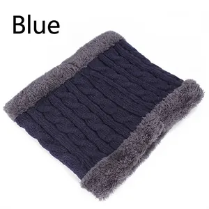 Winter knitted neck warmer in navy blue with thick fleece lining and cable knit pattern
