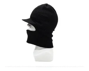 Detail view of black knit balaclava with brim and ribbed texture for winter protection