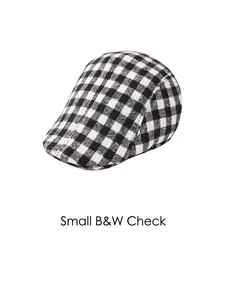 Close-up of black and white checkered fabric texture on a vintage woolen flat cap