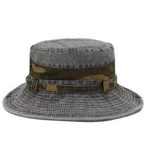 Detail of grey washed denim sun hat with camo trim band and reinforced stitching