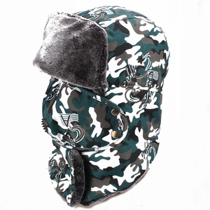Close-up of camouflage trapper hat with gray faux fur lining and detachable face mask