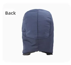 Rear view of deep blue winter trapper hat with waterproof fabric and black faux fur lining
