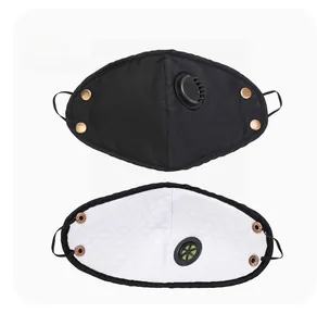 Detail of reusable mask with breathing valve, gold buckles and diamond quilted lining