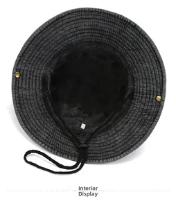Interior view of black bucket hat showing windproof cord and detailed inner lining