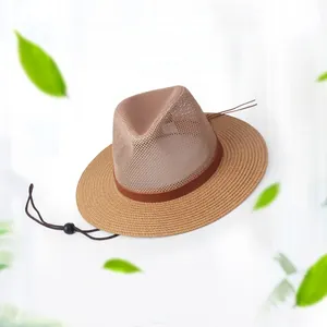 Close-up of a breathable mesh crown and woven brim straw sun hat with adjustable drawstring
