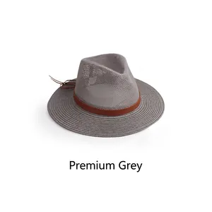 Close-up of grey mesh sun hat featuring a brown leather decorative band and breathable fabric