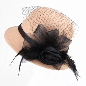 Elegant camel wool felt fascinator hat with black mesh veil, rose and feather decor