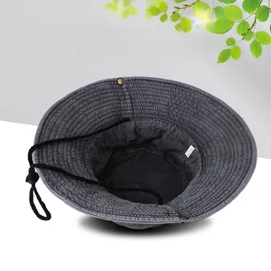 Detail view of cotton sun hat interior with 100% cotton label and adjustable windproof cord