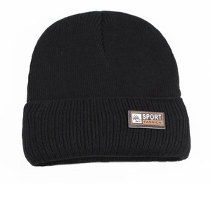 Close-up of black ribbed knit beanie with brown leather sport fashion patch detail