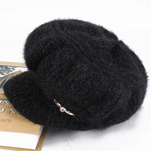 Chic black fleece newsboy hat for women with elegant golden buckle and plush texture