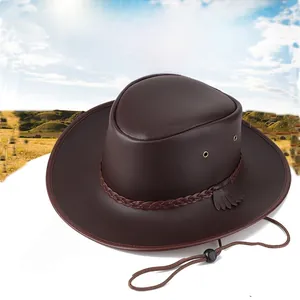 Detail of wide brim brown cowboy hat with leather cord and metal air vents for sun protection