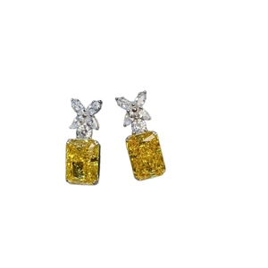 Sparkling S925 silver stud earrings with yellow radiant cut gemstones in flower design