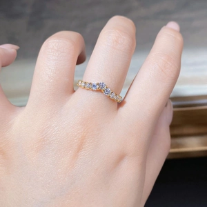 Detail of 18K gold plated S925 silver V-shaped ring with pavé moissanite stones