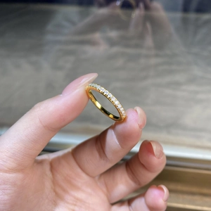 Minimalist S925 sterling silver eternity ring with 18K gold plating and moissanite