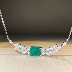 Elegant S925 silver necklace with emerald-cut green gemstone and marquise diamond accents