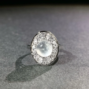 Imperial green chalcedony oval ring with double halo crystals and silver band