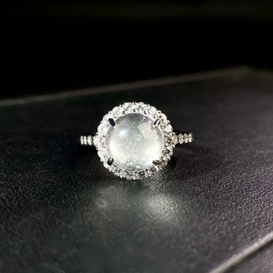 Elegant adjustable silver ring with round green chalcedony stone and halo crystals