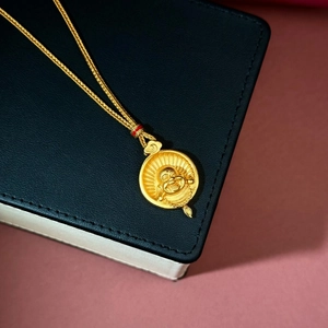 18K gold plated Maitreya Buddha pendant necklace with woven golden cord and red accents