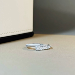 Elegant 925 sterling silver criss-cross ring with brushed texture and pave-set zircons