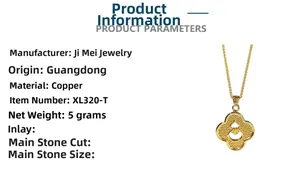 Macro shot of gold filigree pendant necklace with intricate four-leaf clover motifs
